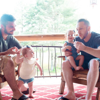 a married gay couple with their children.